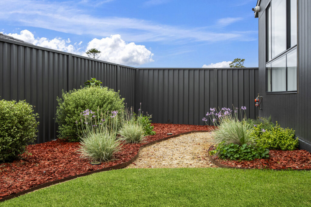 Landscaped garden and boundary fence at a completed Daylo Build project